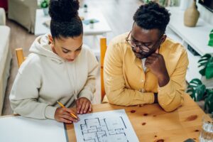 People looking at drawings